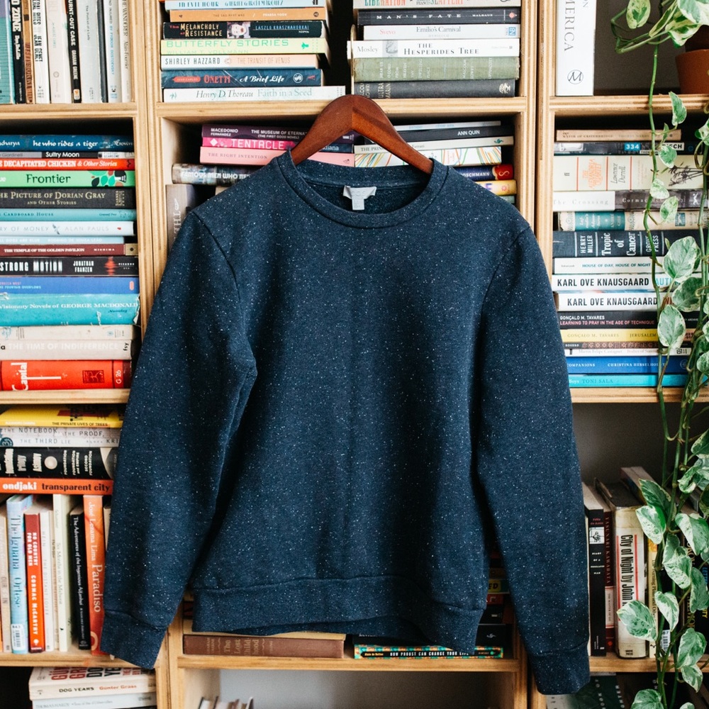 COS women’s speckled dark blue sweatshirt